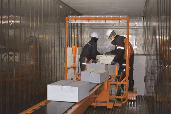 海上コンテナ用荷降ろし装置
